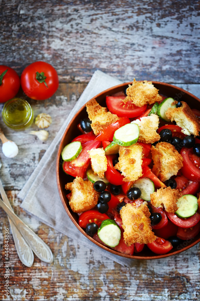 Panzanella salad with bread, olives and tomatoes. Panzanella salad with bread, olives and tomatoes.