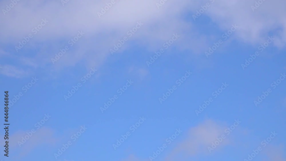White clouds move and dissolve in the blue sky.. White clouds move and dissolve in the blue sky..