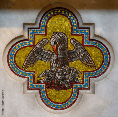 Mosaic of a pelican feeding his offspring with his flesh and blood as a symbol of Jesus Christ. Votivkirche, Wien – Votive Church, Vienna, Austria. 2020-07-29. 