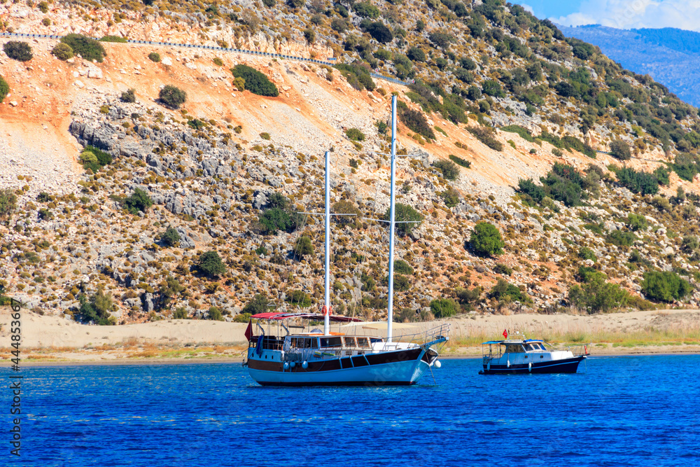 Yachts sailing in the Mediterranean sea near Kekova island in Antalya province, Turkey. Turkish Riviera