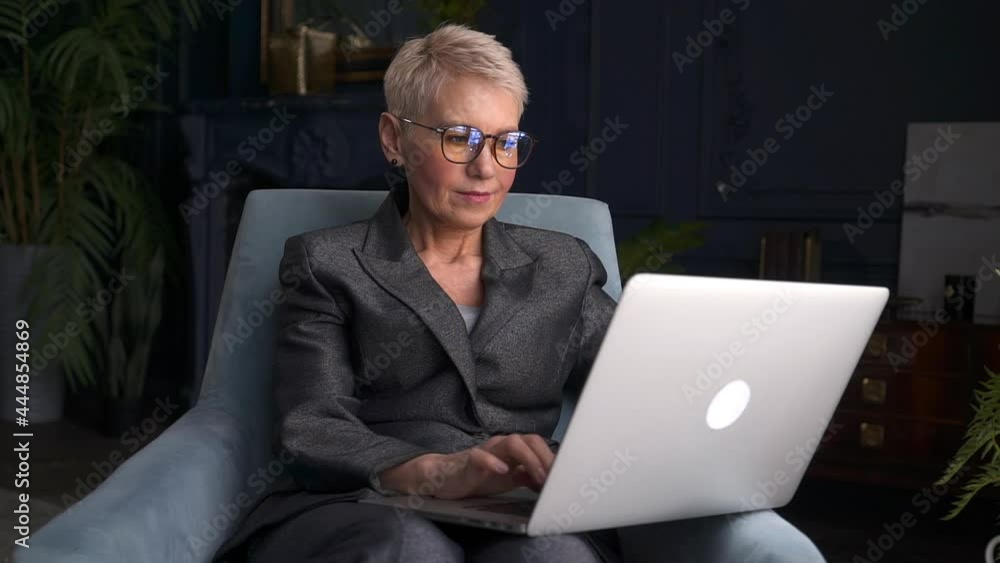 Businesswoman using laptop for work or self study and sitting at home office akspb. Businesswoman using laptop for work or self study and sitting at home office akspb.