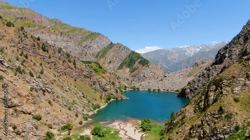 Aerial View Of The Blue Water Of Urungach Lake On The Middle Of The Mountains In Uzbekistan. photo