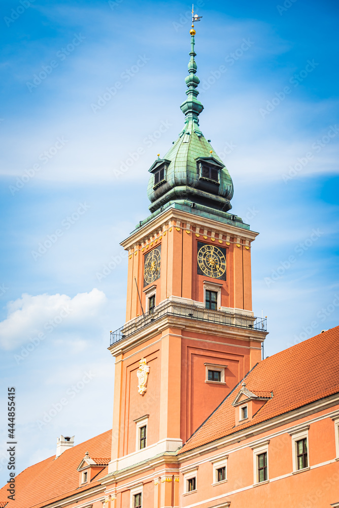 Close view of the Clock tower of The Royal Castle in the old town city center of Warsaw, Poland.