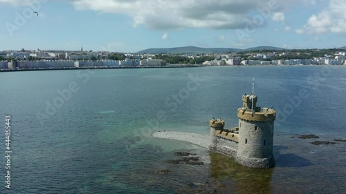 flying counter clockwise around the Tower of Refuge in Douglas Isle of Man photo