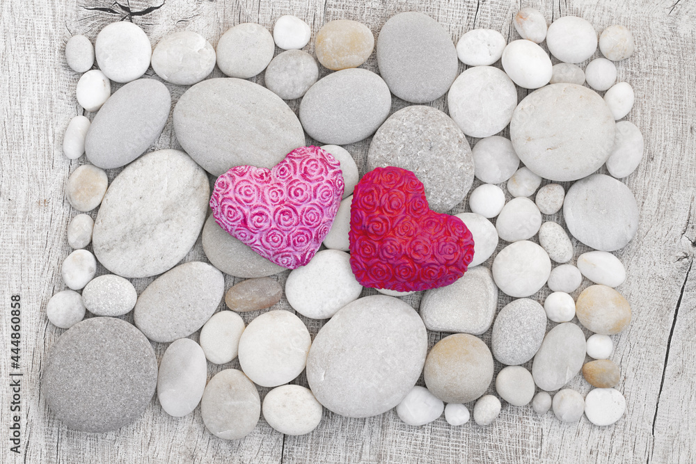 Obraz premium Pink Hearts On White Pebble