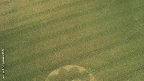 Top Down View Of Crop Circle In The Field In Sutton Scotney, Hampshire, England - aerial drone shot photo