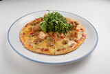 baked cheesy pizza with bbq sauce chicken and duck meat in white background western halal menu