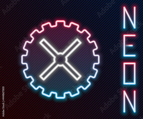 Glowing neon line Bicycle sprocket crank icon isolated on black background. Colorful outline concept. Vector