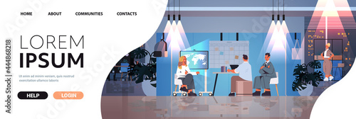 tired businesspeople working together in creative coworking center teamwork concept dark night office interior