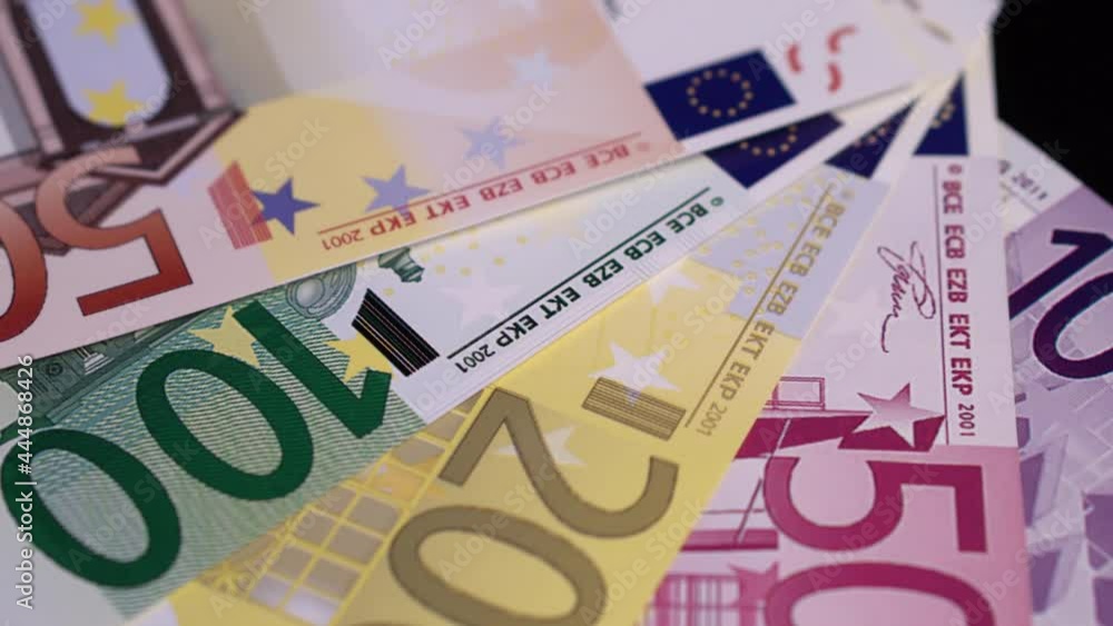 Counterfeit Euro Banknotes, Close Up. Fake Money on Normal Paper Counterfeit Euro Banknotes, Close Up. Fake Money on Normal Paper