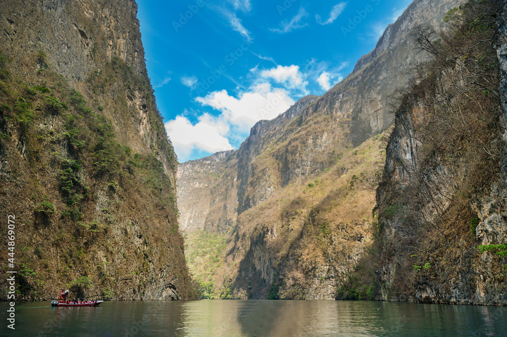 View of Sumidero Canyon in Chiapas, Mexico with a beautiful blue sky View of Sumidero Canyon in Chiapas, Mexico with a beautiful blue sky