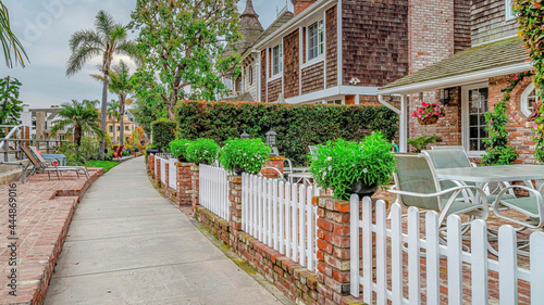 Pano Beautiful homes along pathway and canal in picturesque Long Beach California