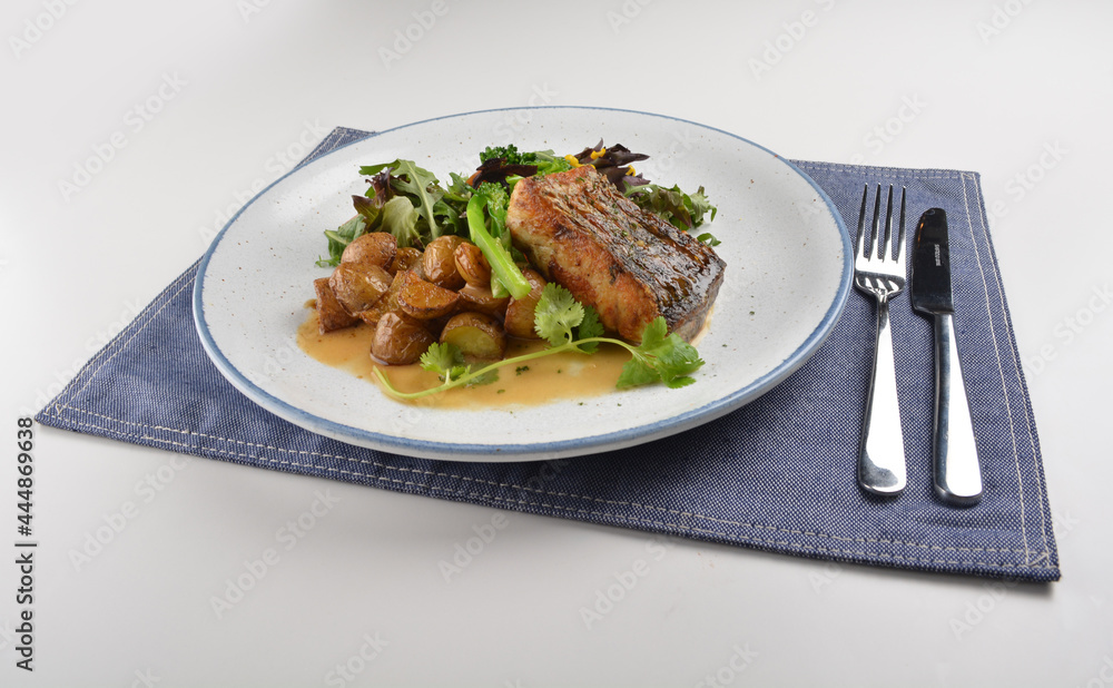 pan fried bbq fresh cod, salmon, grouper fish fillet in chef sauce with potato, corn and vegetables western halal menu pan fried bbq fresh cod, salmon, grouper fish fillet in chef sauce with potato, corn and vegetables western halal menu
