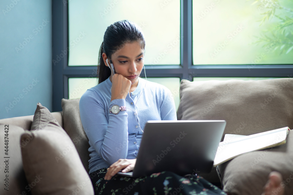 YOUNG GIRL MAKING NOTES WHILE ATTENDING ONLINE CLASS
YOUNG GIRL MAKING NOTES WHILE ATTENDING ONLINE CLASS