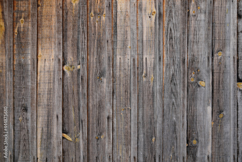 Vintage retro brown wood veritcal background in old weathered wooden plank