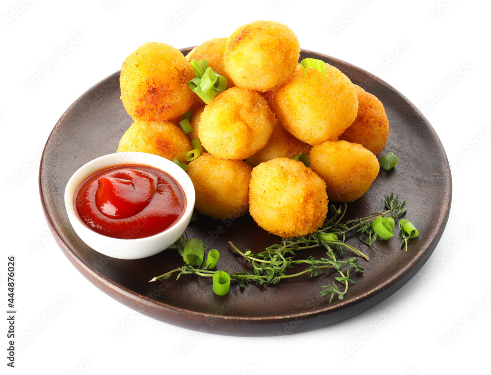 Plate with fried potato balls on white background Plate with fried potato balls on white background