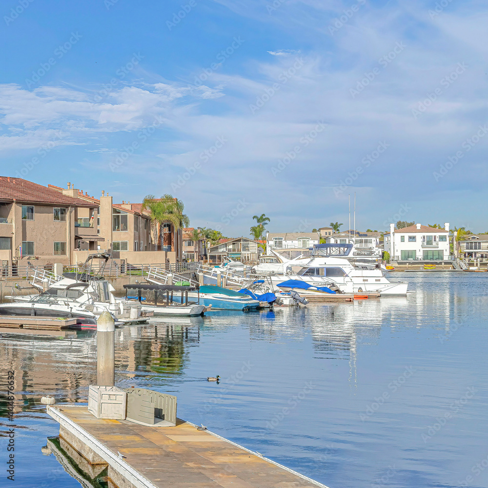 Square Beautiful harbour views with boats and docks in Huntington Beach California