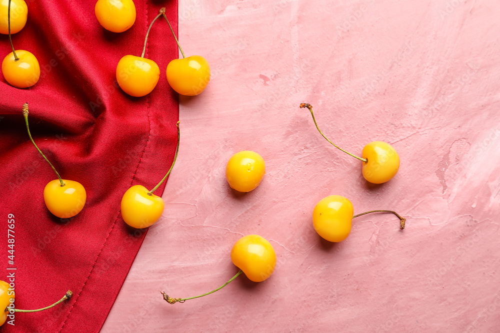 Tasty sweet cherries on color background Tasty sweet cherries on color background