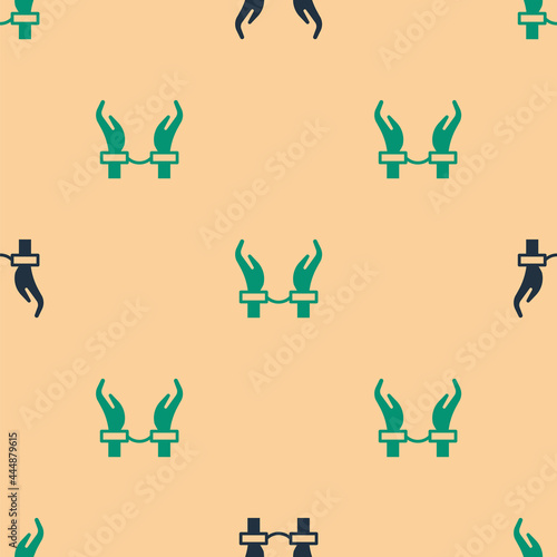 Green and black Handcuffs on hands of criminal man icon isolated seamless pattern on beige background. Arrested man in handcuffs. A crime, arrest, business and corruption concept. Vector