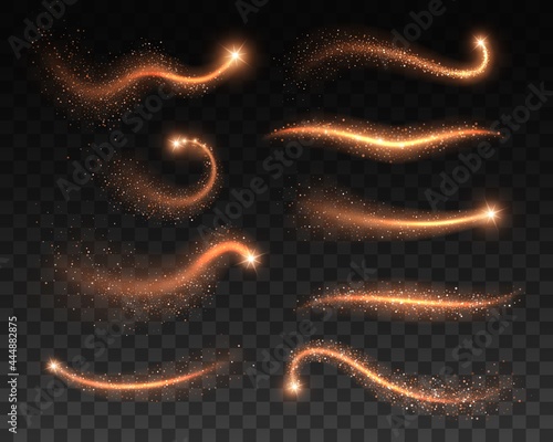 Golden stardust and glitters on transparent background. Vector magic sparkling dust of gold star trails, glowing waves of shining confetti and sparks, Christmas light effect, wave of the magic wand