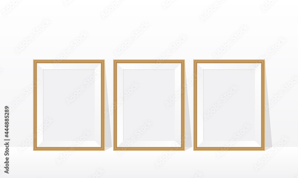 Three wood frame on the floor white wall 3d mockup illustration Three wood frame on the floor white wall 3d mockup illustration