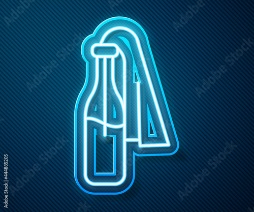 Glowing neon line Cocktail molotov icon isolated on blue background. Vector