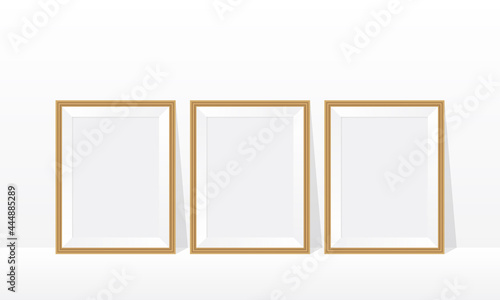 Three wood frame on the floor white wall 3d mockup illustration