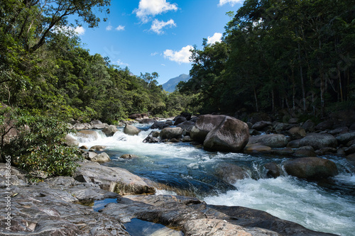 Water flowing at Mossman Gorge locate in the rural locality in the Shire of Douglas, Queensland, Australia. Mossman Gorge created by the Mossman River through the Daintree National Park.