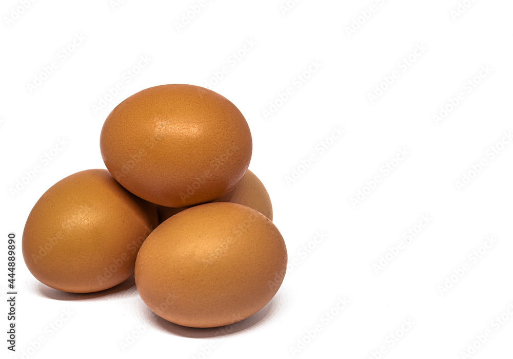Pyramid stack of hen eggs isolated on a white background Pyramid stack of hen eggs isolated on a white background