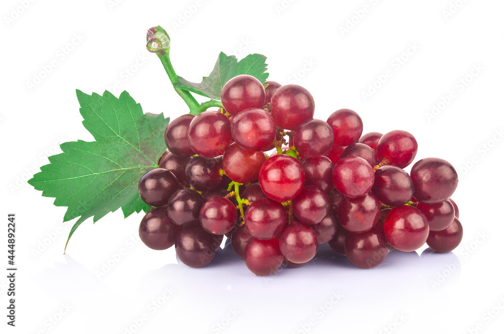 Ripe red grape. Pink bunch with leaves isolated on white. With clipping path. Full depth of field.