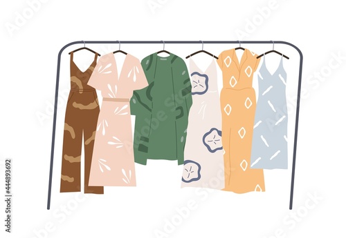 Modern wardrobe of summer clothing hanging on floor hanger rack. Casual women apparels. Collection of stylish garments. Dresses and overall with prints. Flat vector illustration isolated on white