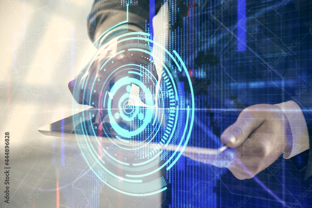 Double exposure of man's hand holding and using a digital device and data theme hologram drawing. Technology concept. Double exposure of man's hand holding and using a digital device and data theme hologram drawing. Technology concept.