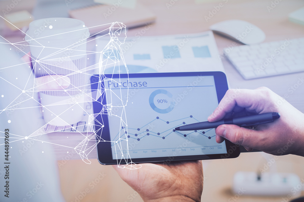 Double exposure of man's hands holding and using a mobile device and creative hologram drawing. Double exposure of man's hands holding and using a mobile device and creative hologram drawing.