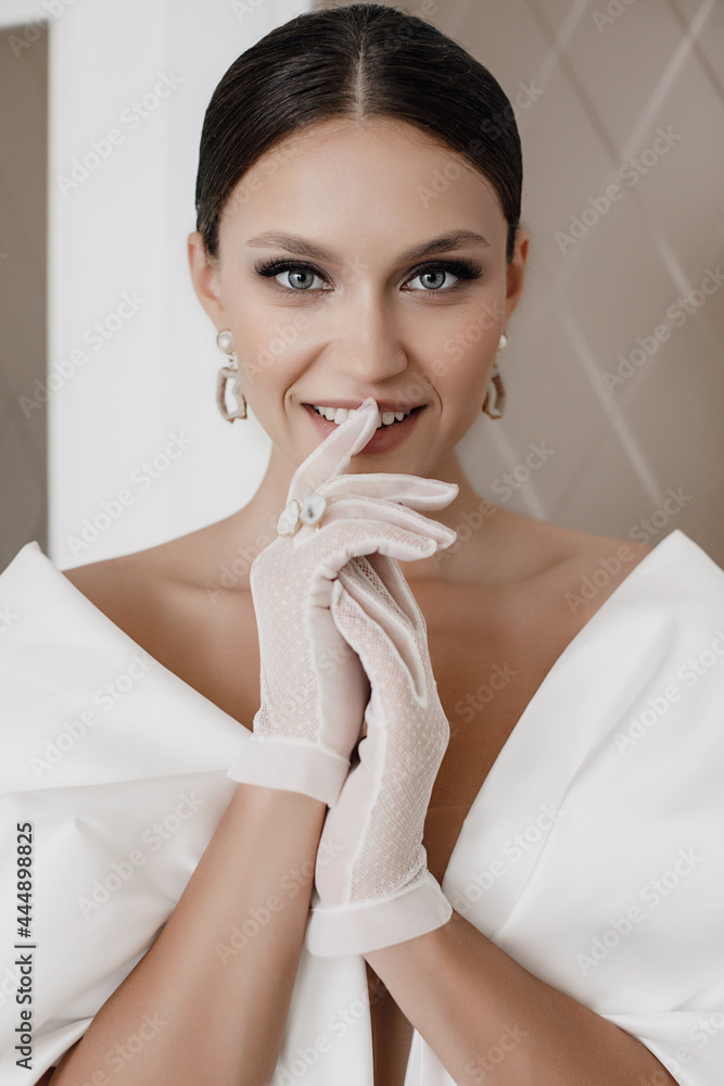 Portrait of a beautiful bride in luxury wedding dress. Portrait of a beautiful bride in luxury wedding dress.