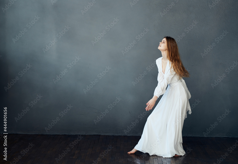 pretty woman in white dress dark background model
