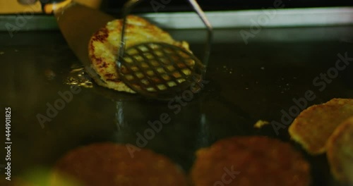 Man and Woman make Ramly Burgers at TTDI Neighborhood in Kuala Lumpur, Malaysia photo