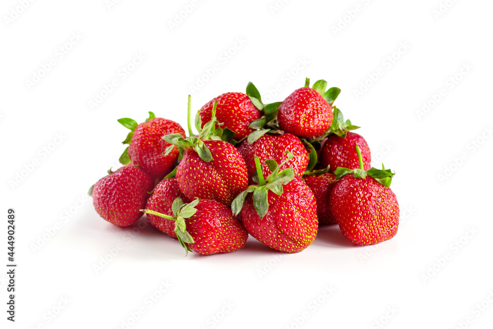 a lot of strawberries on the table, on a white background, a handful a lot of strawberries on the table, on a white background, a handful