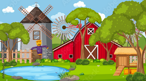 Empty farm scene with red barn and windmill
