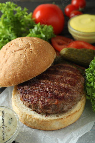 Concept of cooking burger with burger ingredients, closeup