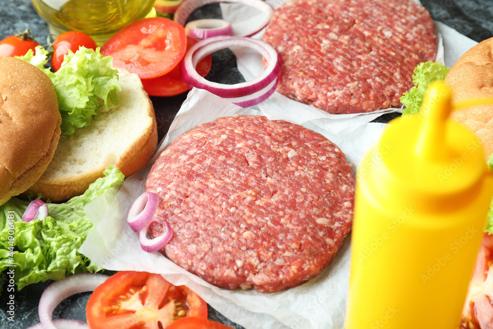 Concept of cooking burger with burger ingredients, closeup Concept of cooking burger with burger ingredients, closeup