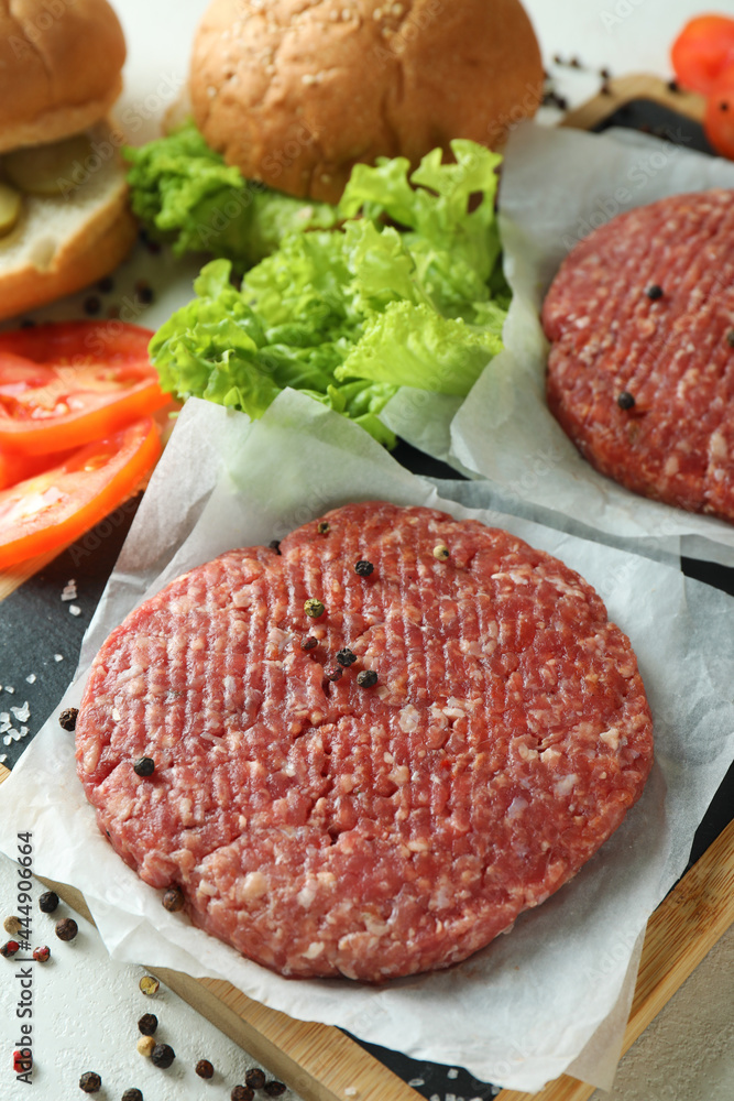 Concept of cooking burger with burger ingredients, closeup Concept of cooking burger with burger ingredients, closeup