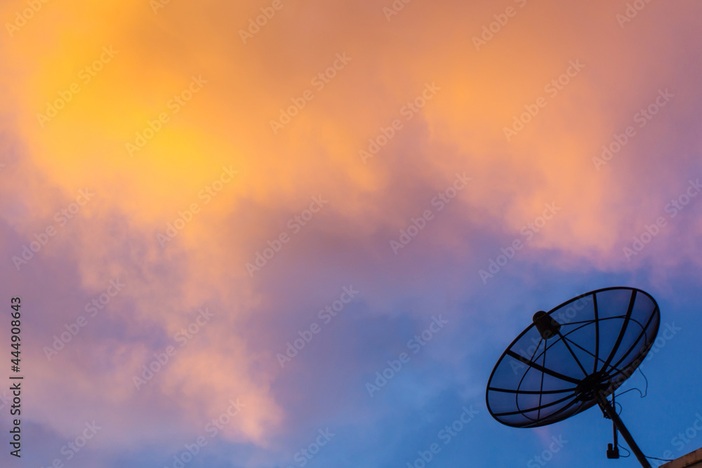 Silhouette satellite Dish on Twilight sky Background.