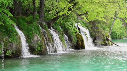 Waterfall in Plitvice Lakes national Park at summer, Croatia. Waterfalls formed by mountain lakes due to melting glaciers photo