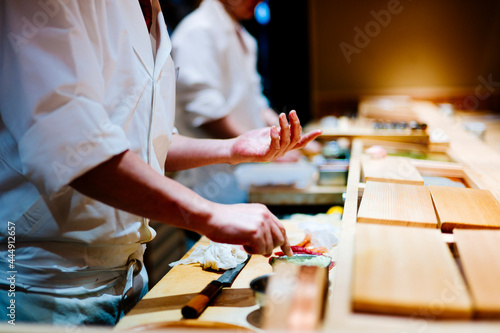 sushi chef hand madecooking