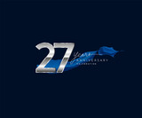 27th Years Anniversary celebration logotype silver colored with blue ribbon and isolated on dark blue background