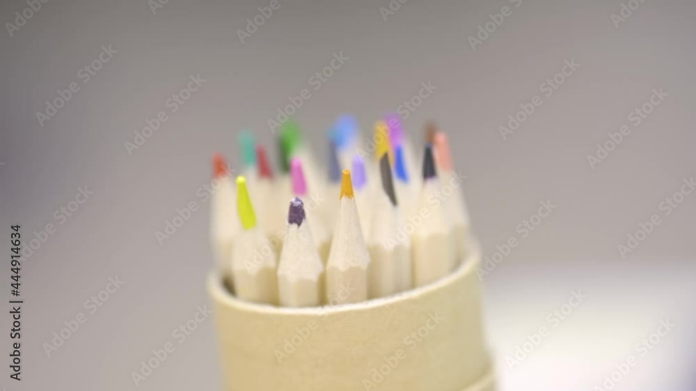 Colored pencils in a paper tube Colored pencils in a paper tube