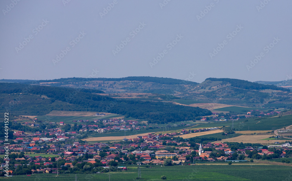 landscape with a village in the foothills of Transylvania