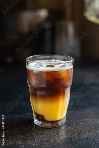 ice coffee orange juice beverage bumble bee cocktail on the table meal copy space food background rustic top view