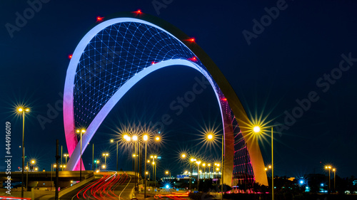 Doha, Qatar - May 26, 2021: Al Wahda Bridge in doha city. known as 56 Bridge of Arch.