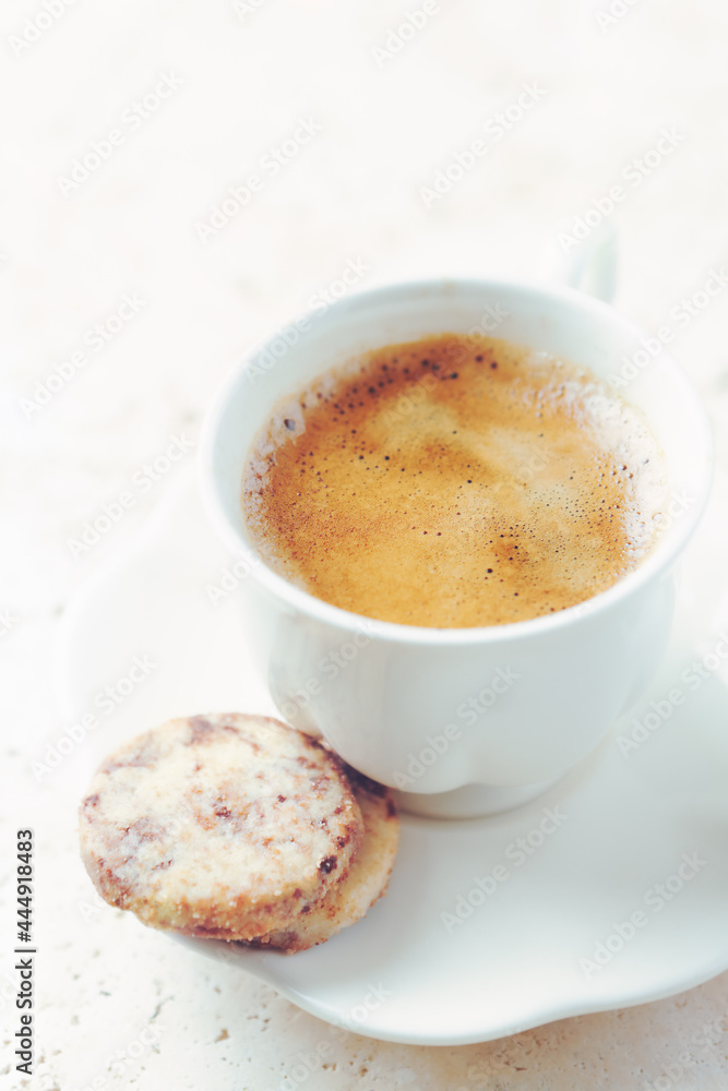 Cup of Coffee on bright stone background. Close up. Cup of Coffee on bright stone background. Close up.